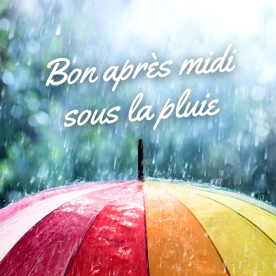 pluie tombant sur un parapluie de couleur arc-en-ciel, avec message de bon après-midi
